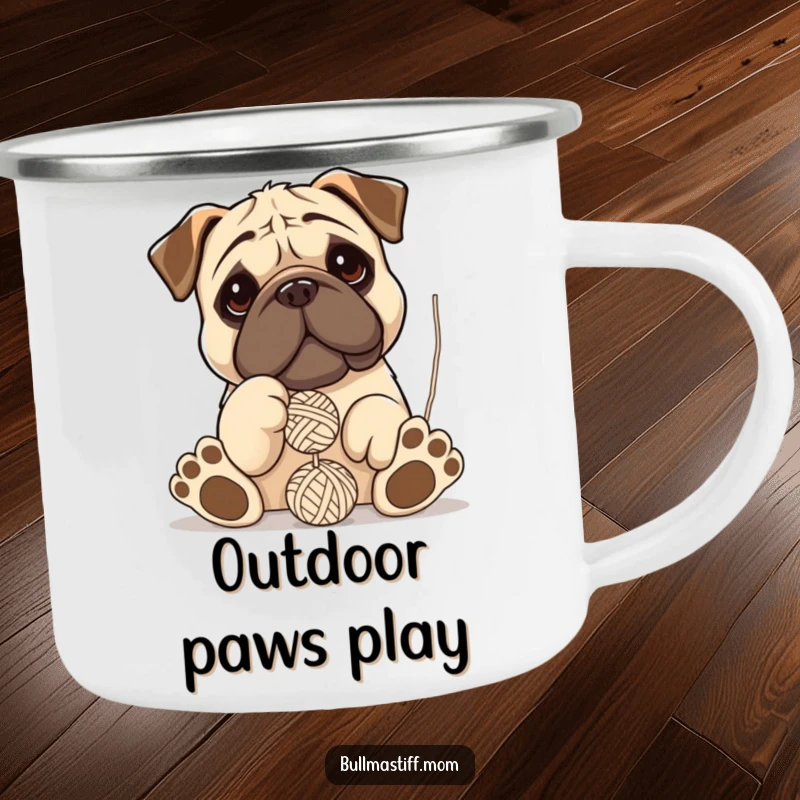 Funny Bullmastiff camping mug showing a dog with oversized paws comically playing and batting at a ball of yarn.