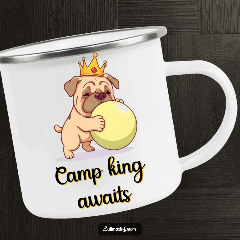 Funny Bullmastiff in a crown, playfully nudging a giant ball, on a durable camping mug.
