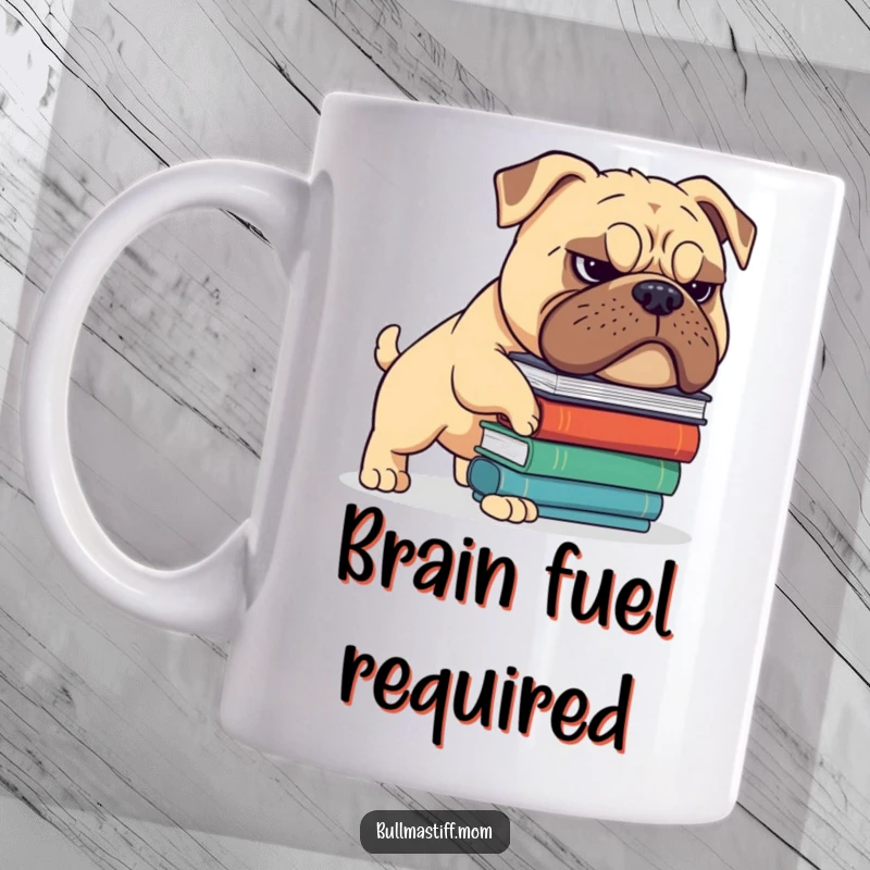 Funny Bullmastiff mug showing a dog with a determined grimace, precariously balancing a tall stack of books. Hilarious scholar dog.