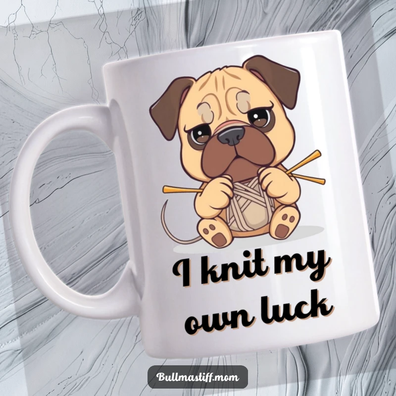 Funny Bullmastiff mug showing a determined dog attempting to knit with needles and yarn, looking very focused.