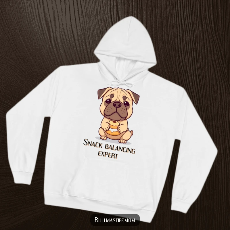 Funny Bullmastiff Hoodie: A gentle Bullmastiff hilariously balances a small pastry on its nose, perfect for cozy, comical relaxation.