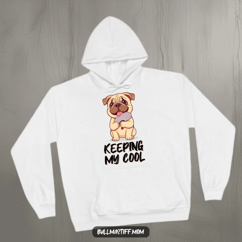 Funny Bullmastiff dog happily balancing a lace fan on its head, on a warm and cozy hoodie.