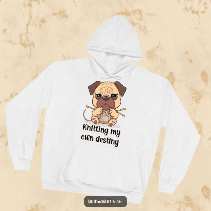 Funny Bullmastiff hoodie showing a determined dog attempting to knit, focused on its yarn project.