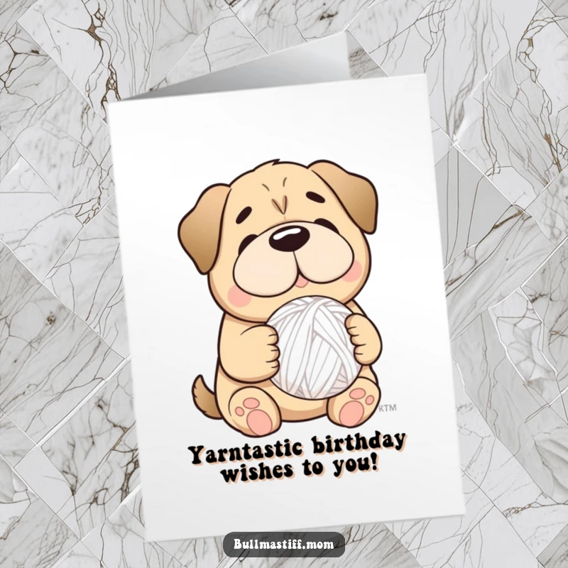 Funny Free Printable sweet Bullmastiff smiling, holding a fluffy yarn ball, perfect for a birthday card.