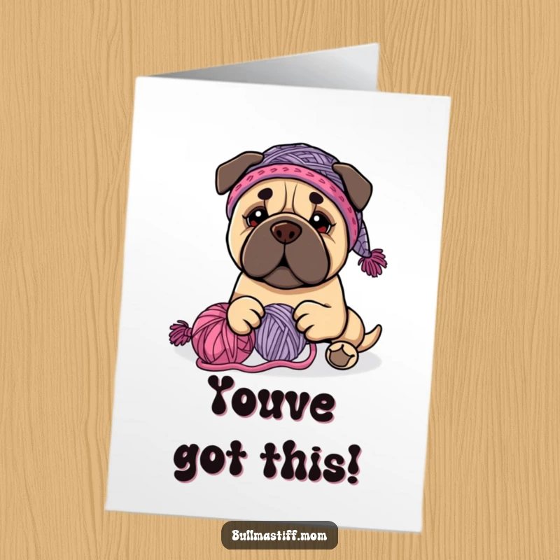 Funny Free Printable Congrats Card: Bullmastiff in a knit hat playing with a ball of yarn.