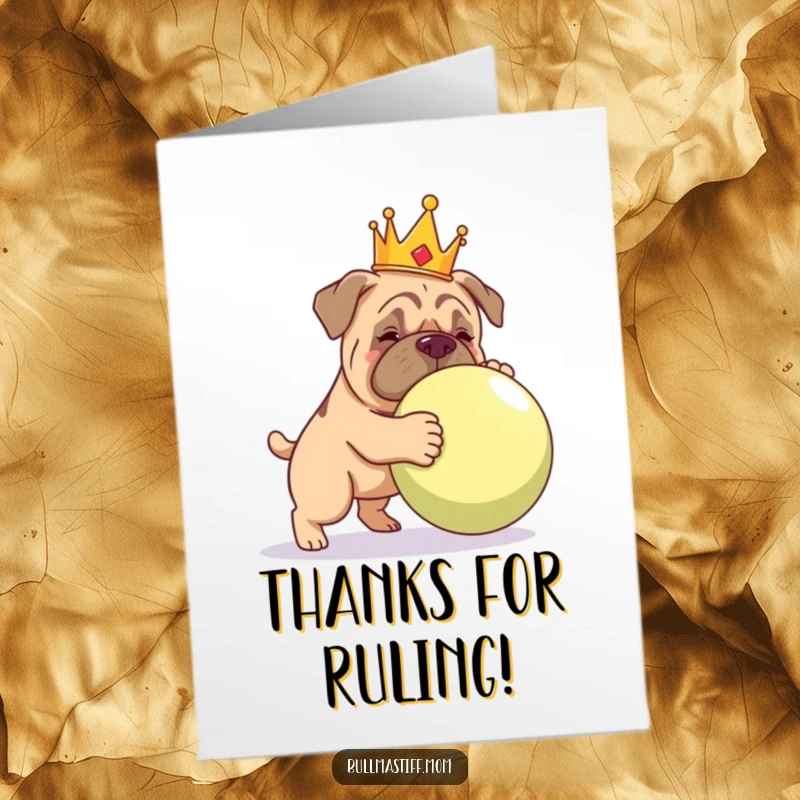 Funny Free Printable Thank You Card: A noble Bullmastiff wearing a crown playfully interacts with a gigantic ball.