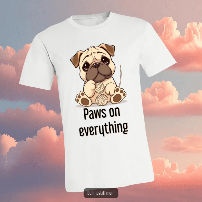 Funny Bullmastiff t-shirt: A large-pawed, clumsy dog hilariously playing and batting at a fluffy ball of yarn.