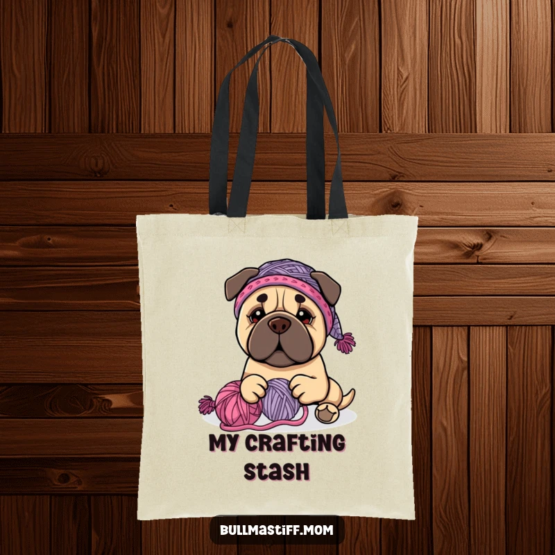 Funny Bullmastiff dog wearing a knit hat, happily playing with yarn, on a stylish tote bag, perfect funny gift.