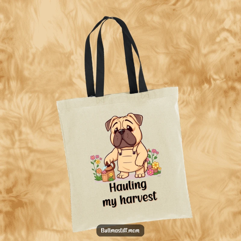 Funny Bullmastiff Tote Bag: A Bullmastiff dog wearing a gardening apron waters a colorful flower.